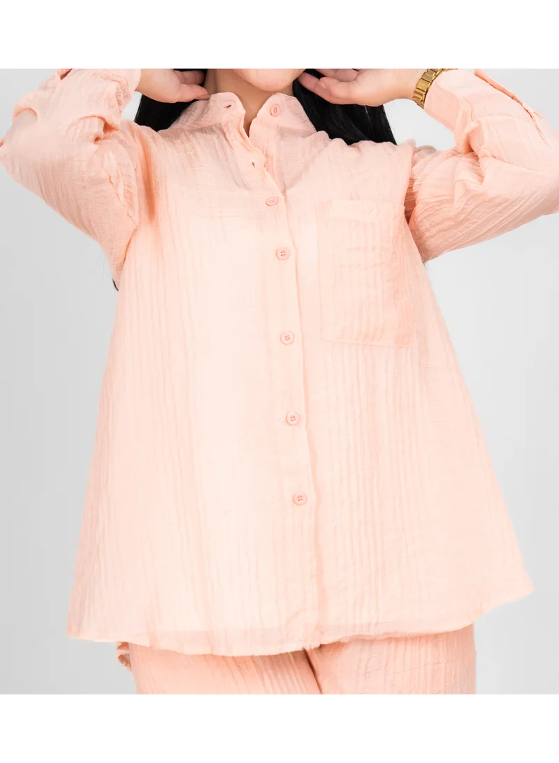 اكسا طقم عصري من قطعتين، قميص وبنطال بلون موحد، قماش شفاف